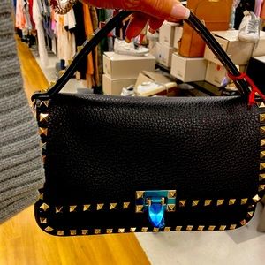 Valentino  black Bag with a strap . Brand New.